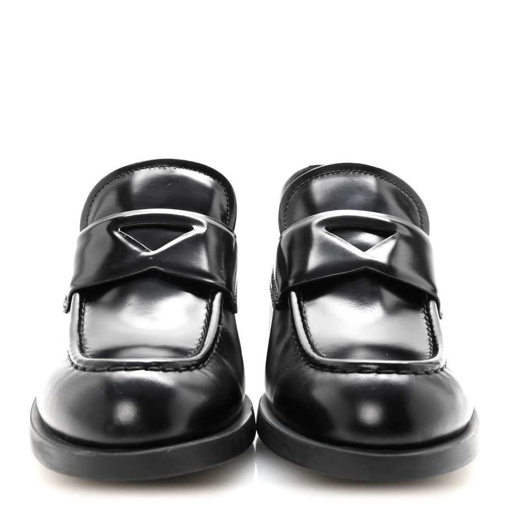 PRADA SPAZZOLATO TRIANGLE LOGO MONOLITH POINTY LOAFERS BLACK