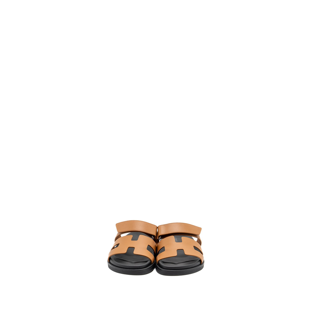 HERMES CHYPRE SANDALS GOLD / BLACK