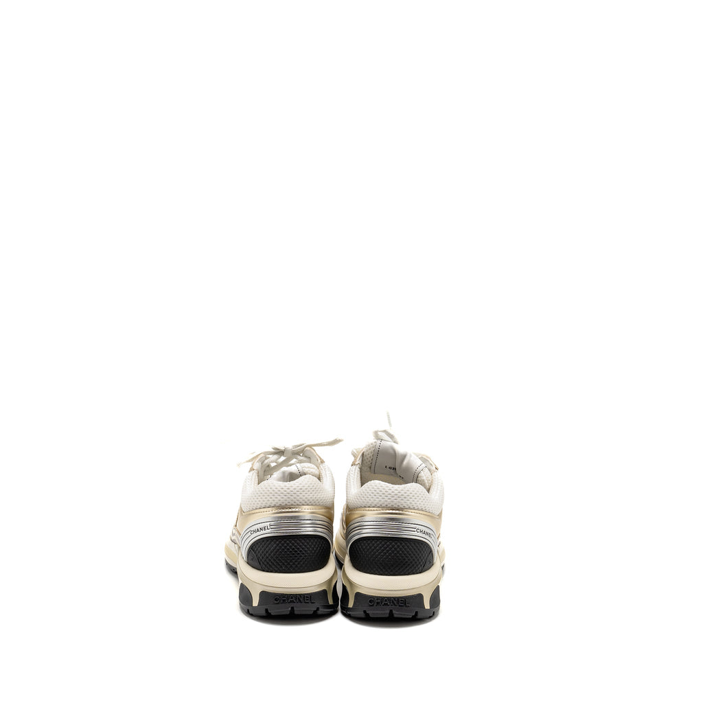 CHANEL CC SNEAKERS FABRIC/LAMINATED WHITE/GOLD/SILVER