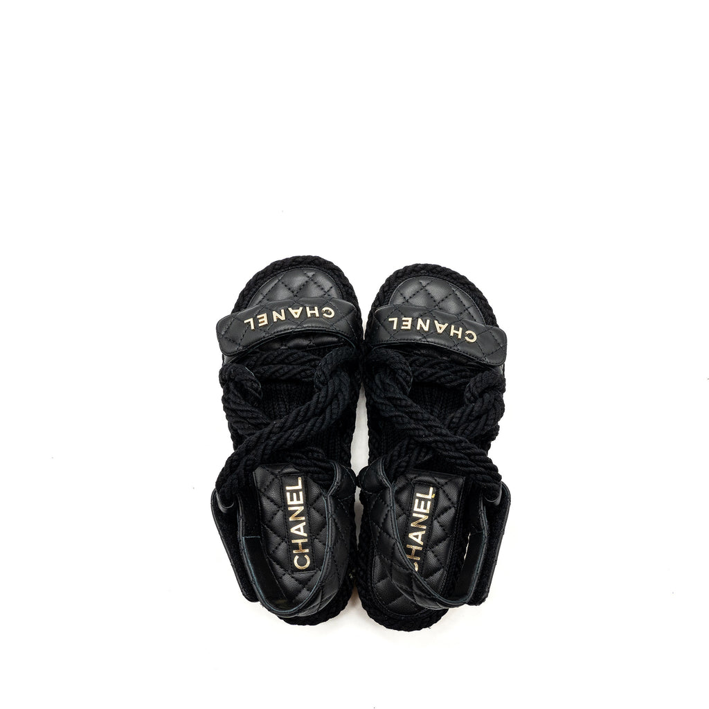 CHANEL 21S QUILTED LETTER SANDALS BLACK SHW