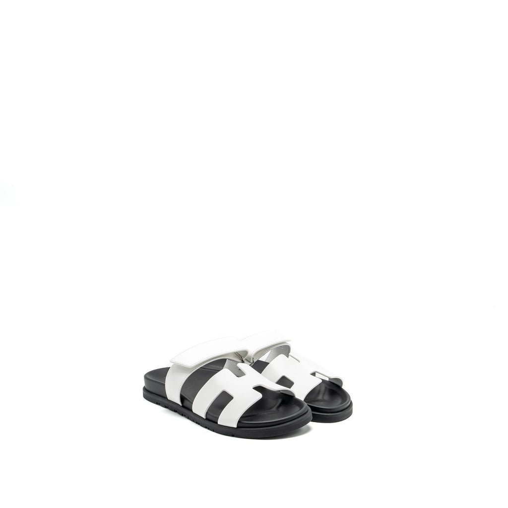 HERMES CHYPRE SANDALS WHITE/BLACK