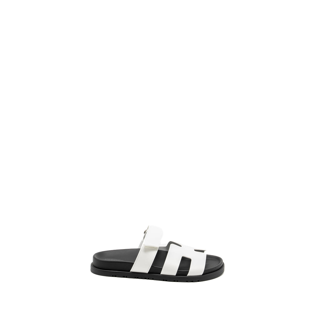 HERMES CHYPRE SANDALS WHITE