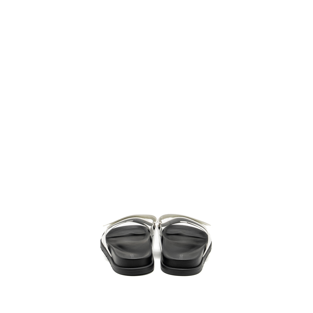HERMES CHYPRE SANDALS WHITE