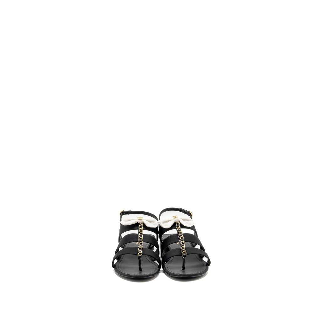 CHANEL 21K GROSGRAIN CHAIN CC LOGO WITH WHITE BOW SANDALS BLACK LGHW
