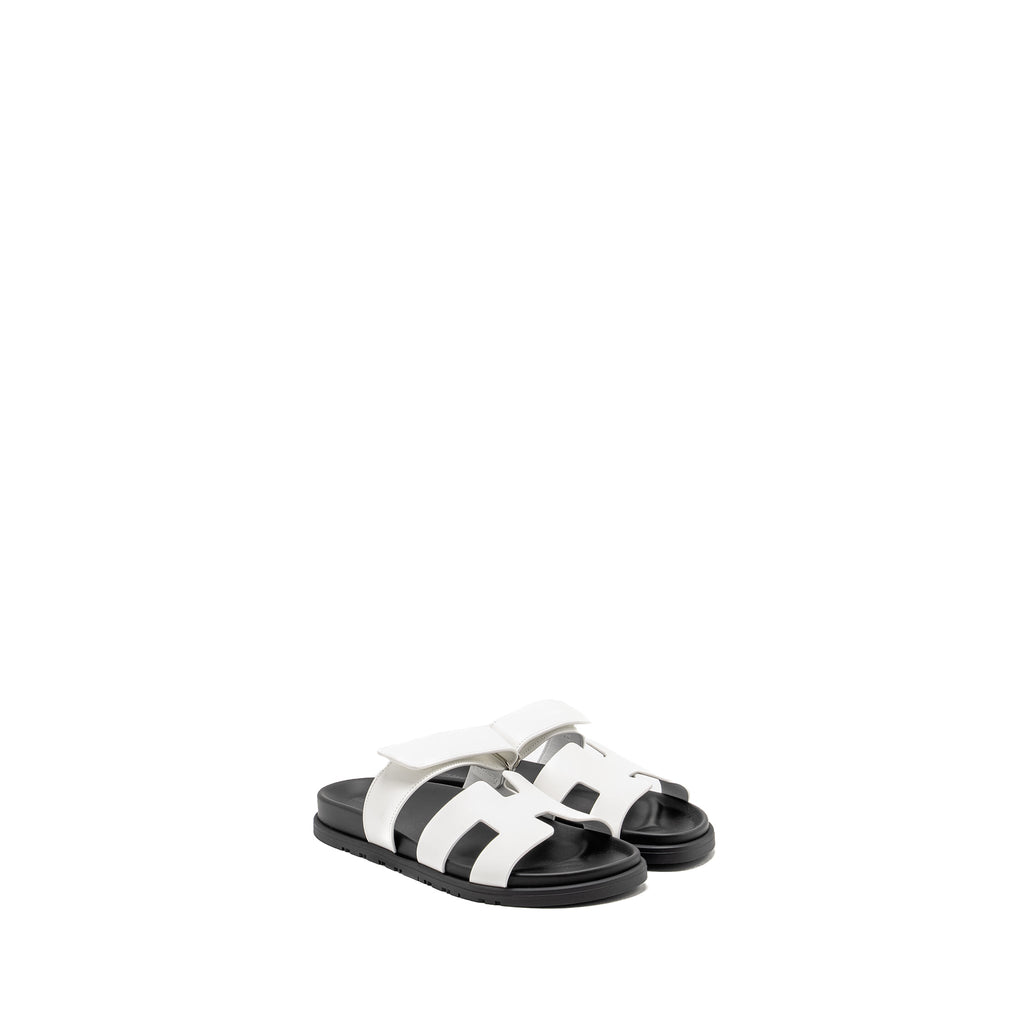 HERMES CHYPRE SANDALS WHITE/BLACK