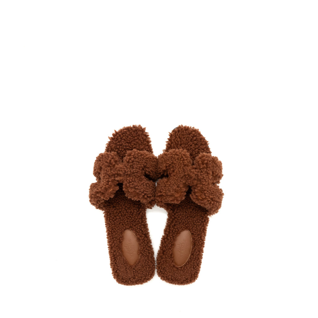 HERMES ORAN SANDAL SHEARLING DARK BROWN