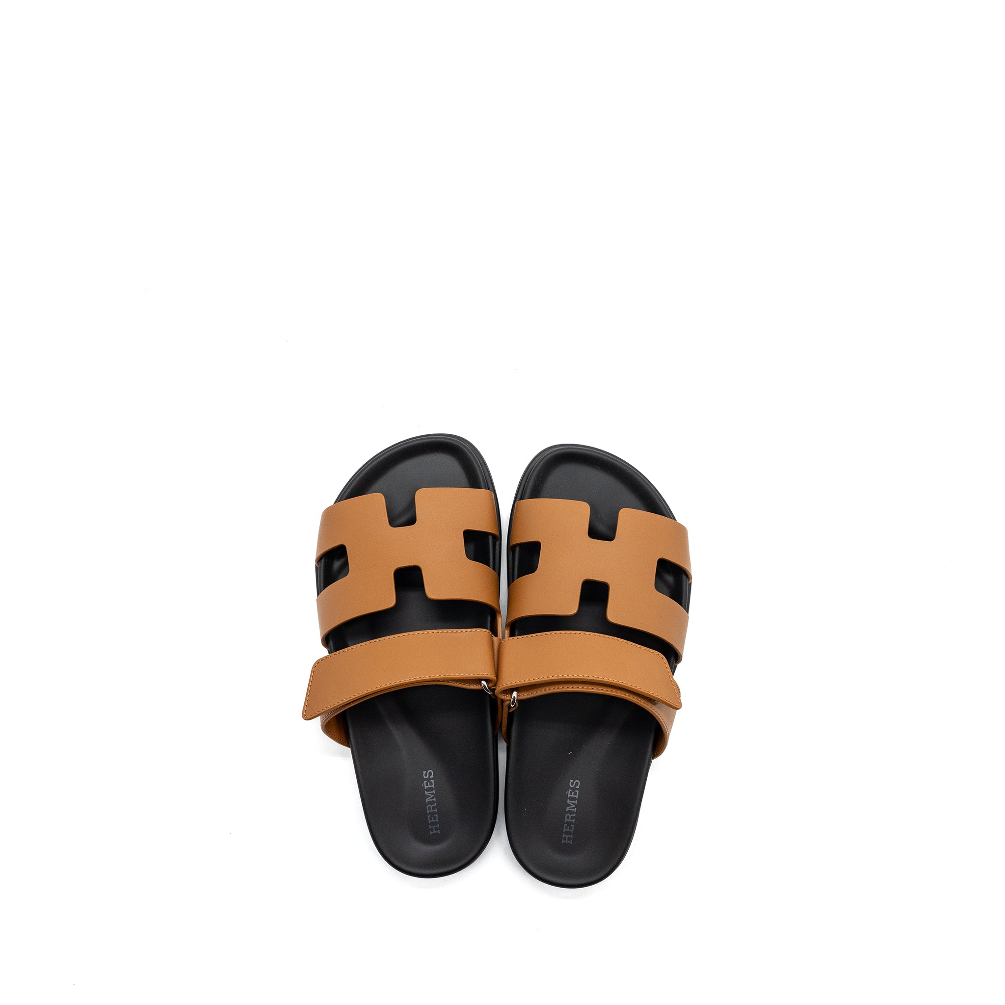 HERMES CHYPRE SANDALS GOLD / BLACK