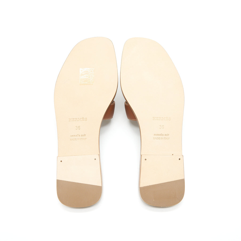 HERMES ORAN SANDALS GOLD
