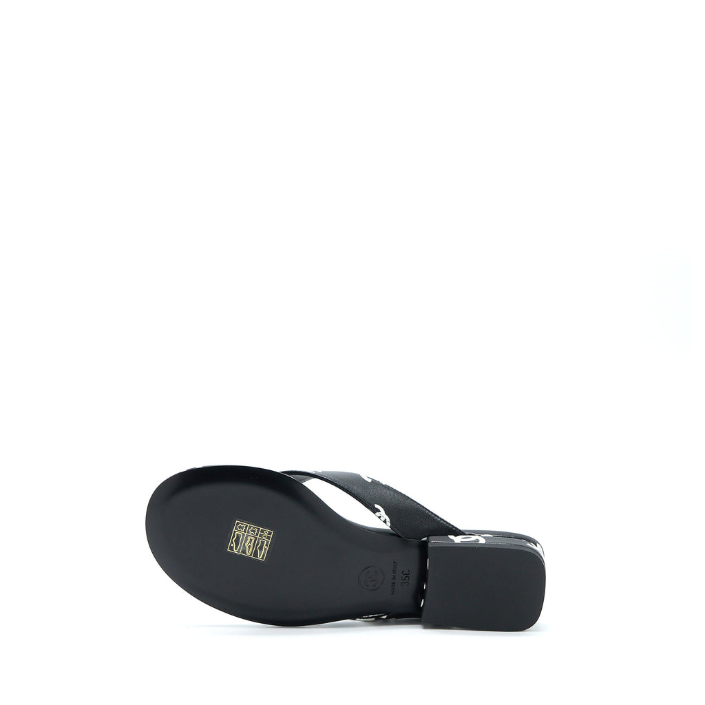 CHANEL 22S CC LOGO FLIP FLOPS PRINTED LAMBSKIN BLACK/WHITE