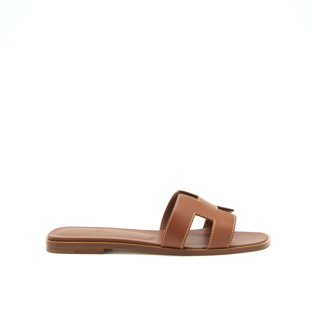 HERMES ORAN SANDALS GOLD