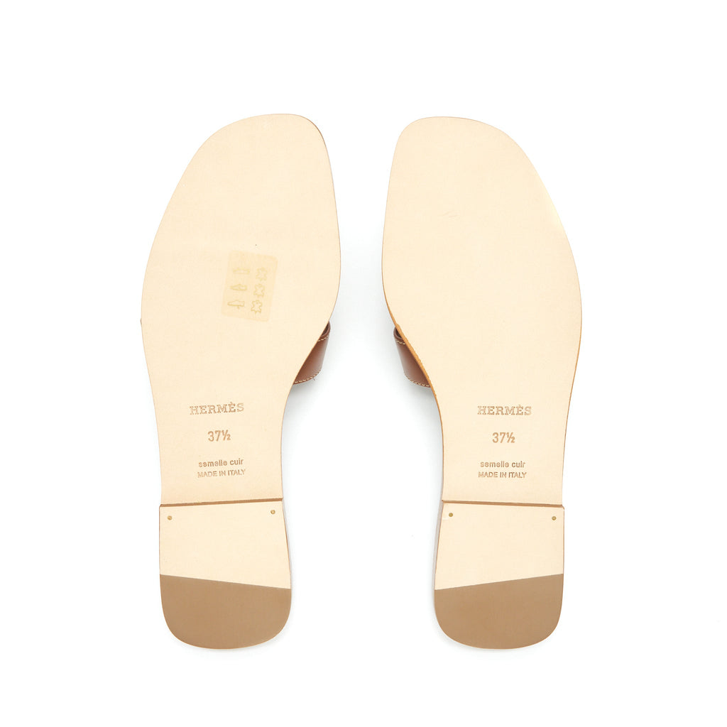 HERMES ORAN SANDALS GOLD