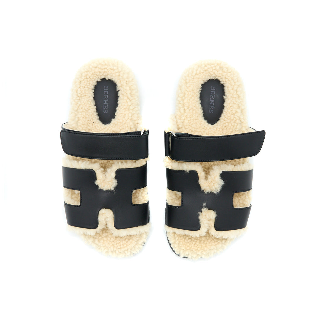 HERMES CHYPRE SANDALS BLACK