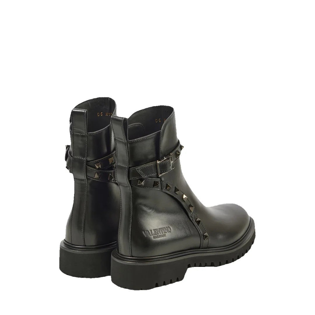 Valentino Garavani Rockstud Leather Chelsea Boots - Black (different model - lug sole combat boot with studded strap, rear view)