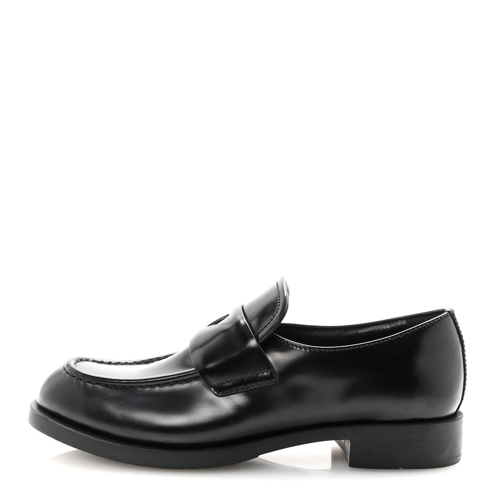 PRADA SPAZZOLATO TRIANGLE LOGO MONOLITH POINTY LOAFERS BLACK