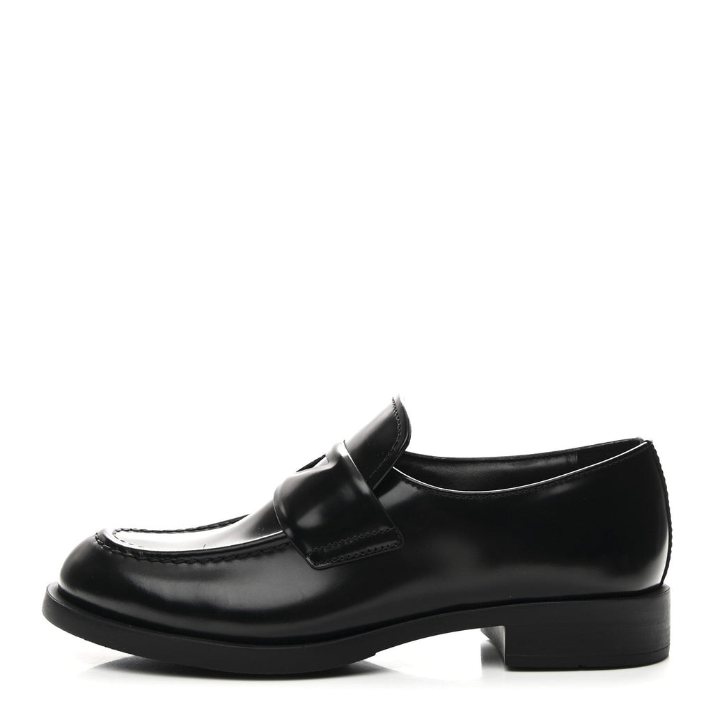 PRADA SPAZZOLATO TRIANGLE LOGO MONOLITH POINTY LOAFERS BLACK