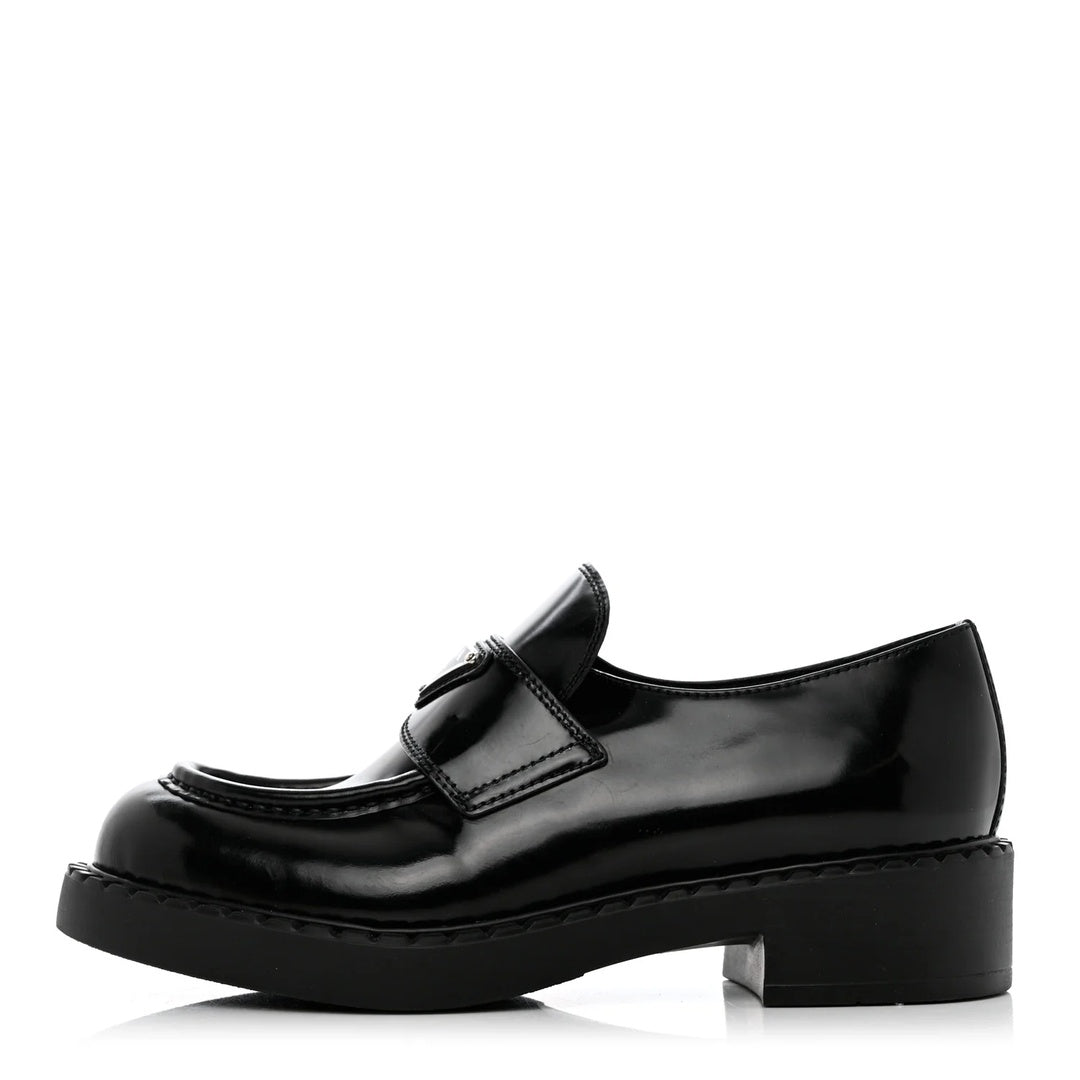 PRADA SPAZZOLATO PADDED TRIANGLE LOGO SLINGBACK FLATS WHITE